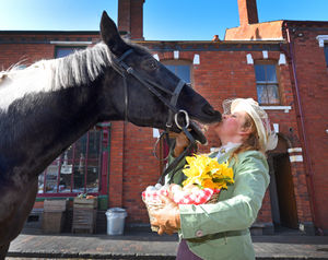 Danny the horse is all smiles as Michelle Darby gives him a kiss as they prepare for Easter at the Black Country Museum