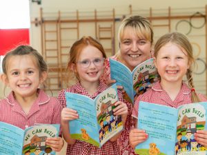 Supporting image for story: House builder in book donation for primary school