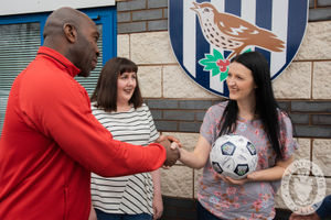 Albion first team coach Darren Moore meets Laura Green and family. Photo West Midlands Police.