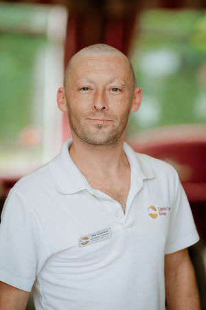 Phil Hemming feels the wind against his head after his head shave