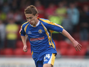 Supporting image for story: Ex-Shrewsbury Town striker Tom Bradshaw is rooting for an FA Cup upset for minnows