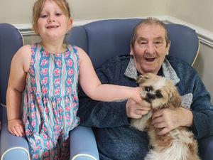 Supporting image for story: Caring Aurora, 6, shares dog to mend care home resident's broken heart