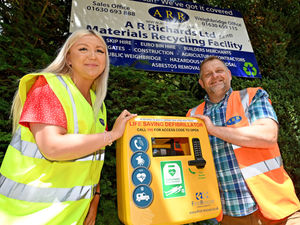 Supporting image for story: Market Drayton firm installs defibrillator to support residents  