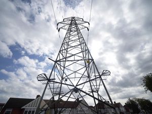 Pylon standing against sky