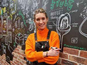 Supporting image for story: Illustrator creates giant mural at Newport coffee shop