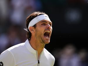 Supporting image for story: Taylor Fritz overcomes medical timeout and rogue tech to reach Wimbledon semis