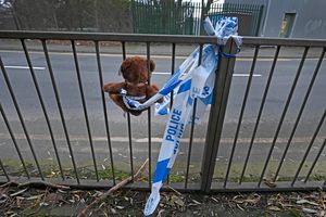 A teddy bear left at the scene of the crash