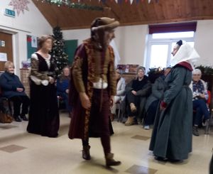 Medieval dancers showing Old Radnor women's institute members their moves