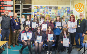 Photo (L-R) Ross Bennett Assistant Head/Learning Manager of Expressive Arts, Robert Evans Builth Wells Rotary President, Year 10 students, Bob Walls competition judge.