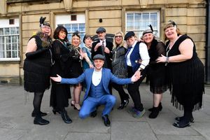 Visitors to the Let's Dance Again event at Wednesbury Town Hall dress as Peaky Blinders to celebrate the new film.David Lane(front) and fellow members show off their outfits.