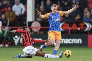 Anthony Scully of Shrewsbury Town and Jamille Matt of Walsall (AMA)