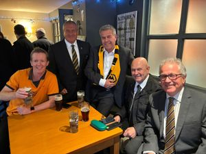 At a funeral for fan Mark Evans, who passed away last Autumn. The dress code was Wolves colours but Charlie didn't get the memo.  From left,  
Clive Hardy, Jon Tilley, Mick Wolverson and Eddie Baker.