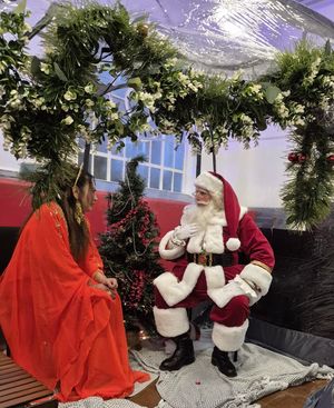 HRH Maha Putri shares a moment with Christmas Royalty, Santa. 