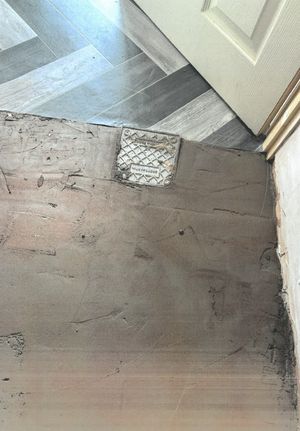 Parker left behind trip hazards, such as an exposed drain cover and unfinished flooring.