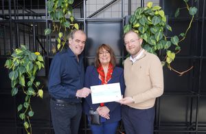 Simon Price of We Love Lichfield receives a cheque for £2,000 from Amanda Watson and
James Austin of Access Bookings