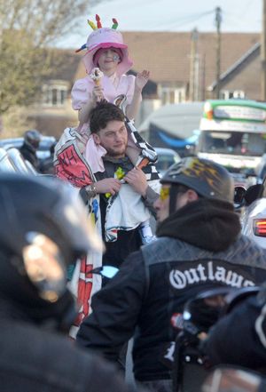  Winnie's dad: Charlie Sutton with his daughter on his shoulders.