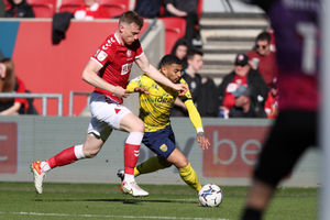 Robbie Cundy of Bristol City and Karlan Grant of West Bromwich Albion during the Sky Bet Championship match between Bristol City and West Bromwich Albion at Ashton Gate on March 19, 2022 in Bristol, England. (Photo by Adam Fradgley/West Bromwich Albion FC via Getty Images).