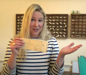 Historian Nicola White with one of the documents.