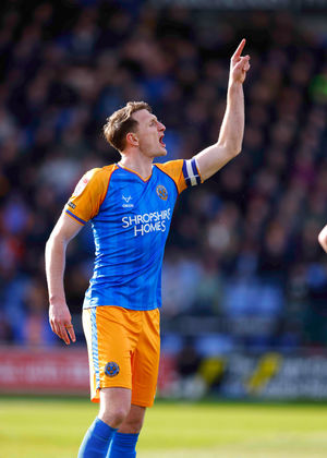 Shrewsbury Town centre back Will Boyle in action against Cheltenham Town