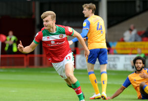George Miller celebrates his goal..