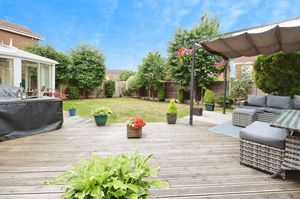 The rear garden is fully enclosed