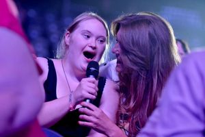 Jessica Henstoe joins in with the singing
