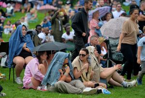 Sheltering from a shower at Ellesmere Carnival