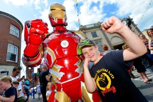 Iron Man stops for a photo with Max Robins, 7, from Stourbridge