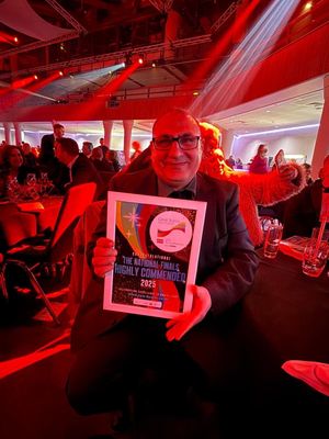 Anas Al Saadi celebrating at the Great British Care Awards