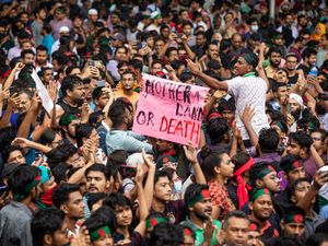 Supporting image for story: Thousands protest in Bangladesh to demand resignation of prime minister
