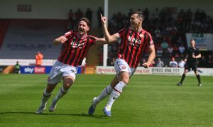 Evan Weir celebrates Walsall's opener after scoring his first goal for the club.