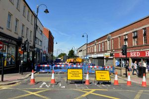 Works have forced the road closure outside businesses 