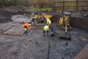 Volunteers working on concreting the basin