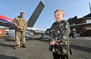 Ace Plant, aged five, came dressed up for the event. He is pictured with Lance Bombadier: Daniel Frewen from South Wales.