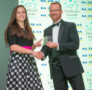 Shannon Davies, receives the Shining Star teenager award from Anton Gunter of
Global Freight Services