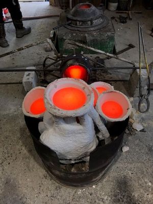 Bronze in ceramic shells at 1180 C as part of the process