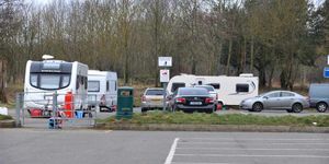 Travellers at the Swan Pool car park in Sandwell Valley Country Park