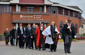 Mayor of Sandwell Richard Jones leads the procession to the Oldbury War Memorial