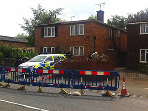 Supporting image for story: Two men questioned after three injured in dog attack