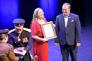 Carrie Pearson and Peter Spence receive the award for New Beginnings