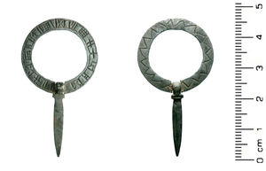 The silver pin brooch