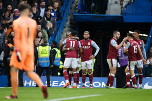 Aston Villa's Ollie Watkins, centre, celebrates after scoring