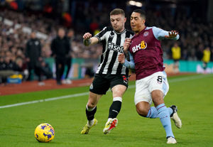 Newcastle United's Kieran Trippier and Aston Villa's Youri Tielemans battle for the ball