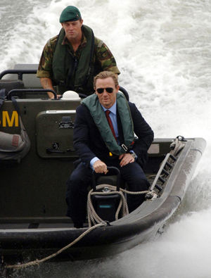 Safety first as Craig arrives by boat at his press unveiling in London