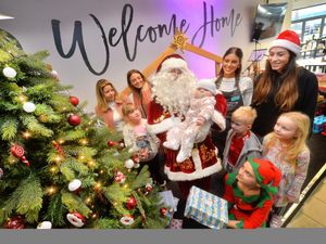 Supporting image for story: Community grocery hosts Santa visit for over 100 Telford children