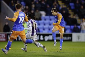 Tom Sang of Shrewsbury Town shoots at goal during the game between Shrewsbury Town and Barnet