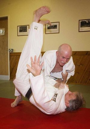 Danny Bidgood 68, black belt in judo throws Geoff Moore at Ford Village Hall.