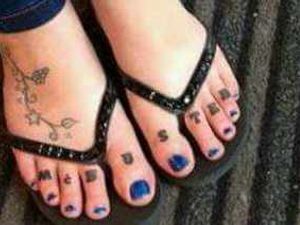 Supporting image for story: A step too far? Superfans show McBusted devotion with tattooed toes