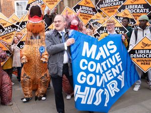 Supporting image for story: Sir Ed Davey poses with ‘Tory dinosaurs’ in latest election campaign stunt