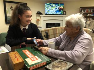 Supporting image for story: Friendship blossoms after chance meeting between Oswestry School pupil and care home resident